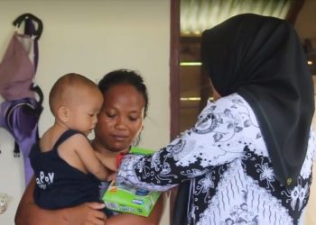 Sukseskan Program BTS, Disdikbud dan PGRI Bolsel Bagikan Paket Makanan Bergizi