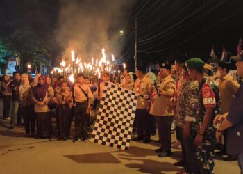 Disdikbud Bolsel Dorong Semangat Patriotisme Siswa Lewat Pawai Taptu